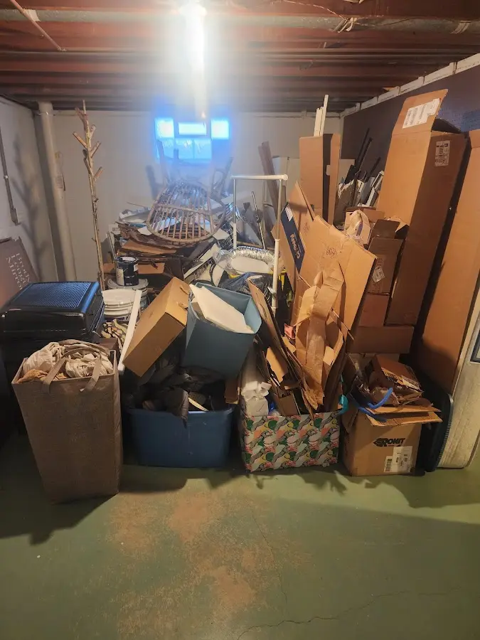 Roll-off dumpster container at job site for 2 Yard Dumpster Rental in West Orange